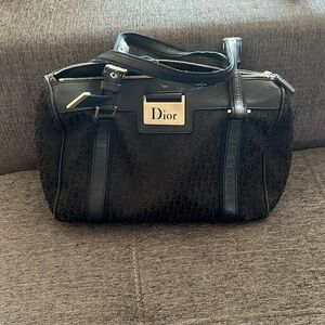 Black Dior monogram silver zipper, adjustable strap